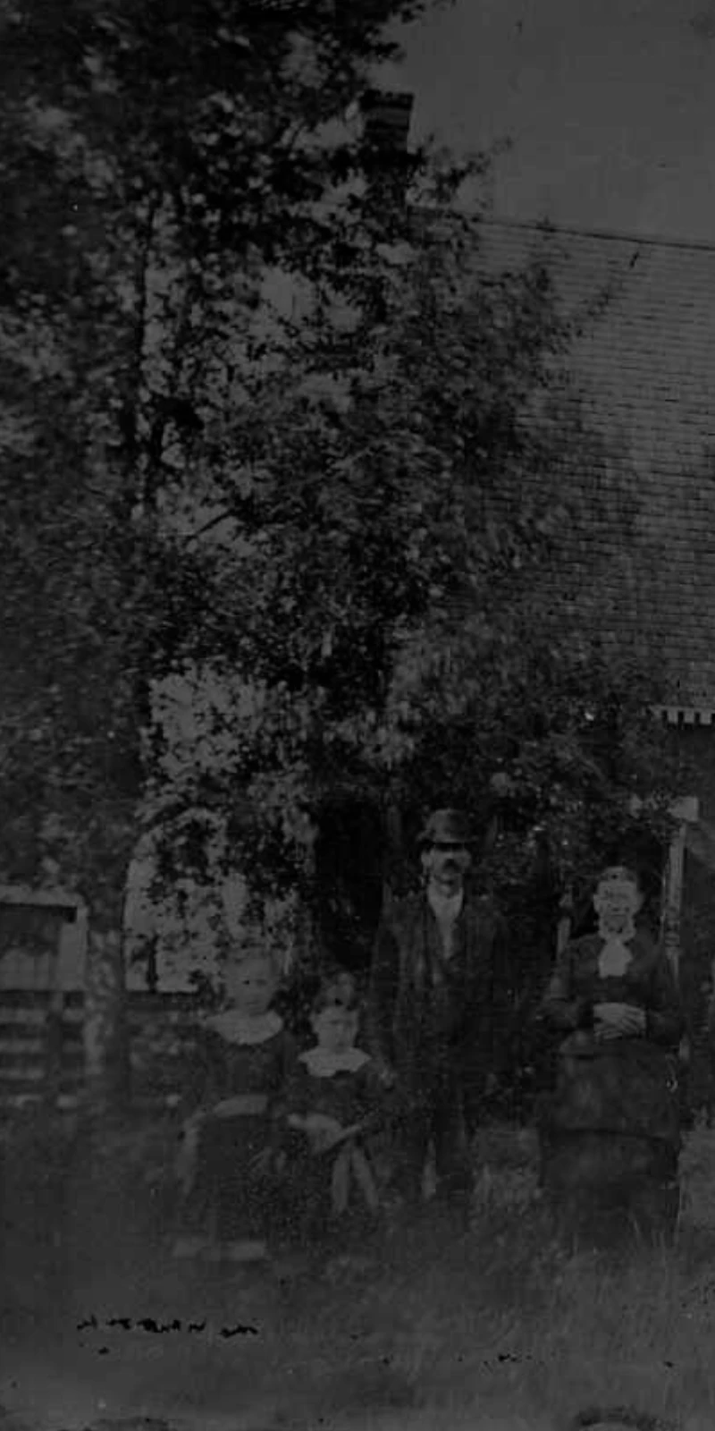 JohninfrontOldHouse John and Family in front of their old house in New York